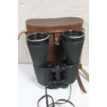 A set of leather cased Japanese Aloma field binoculars,