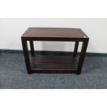A contemporary hardwood side table