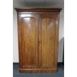 A Victorian mahogany double door wardrobe