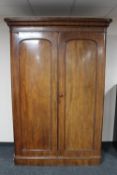 A Victorian mahogany double door wardrobe