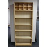 Set of pine effect open bookshelves