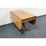 A Victorian mahogany pedestal Pembroke table