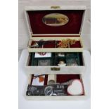 A jewellery box containing costume jewellery : necklaces, earrings, two gents wristwatches,