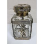 A presentation decanter with highly ornate silver mounts,