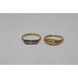 Two 18ct gold five stone diamond rings (2)