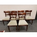 A set of six Victorian mahogany dining chairs