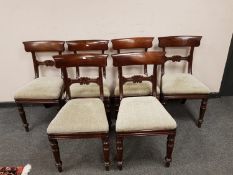 A set of six Victorian mahogany dining chairs