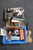Two boxes and a case of part antique violin, vintage ice skates, studio spot lamp, chess board,