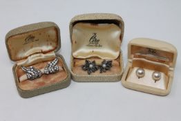 Three boxed pairs of Ciro cultured pearl earrings,