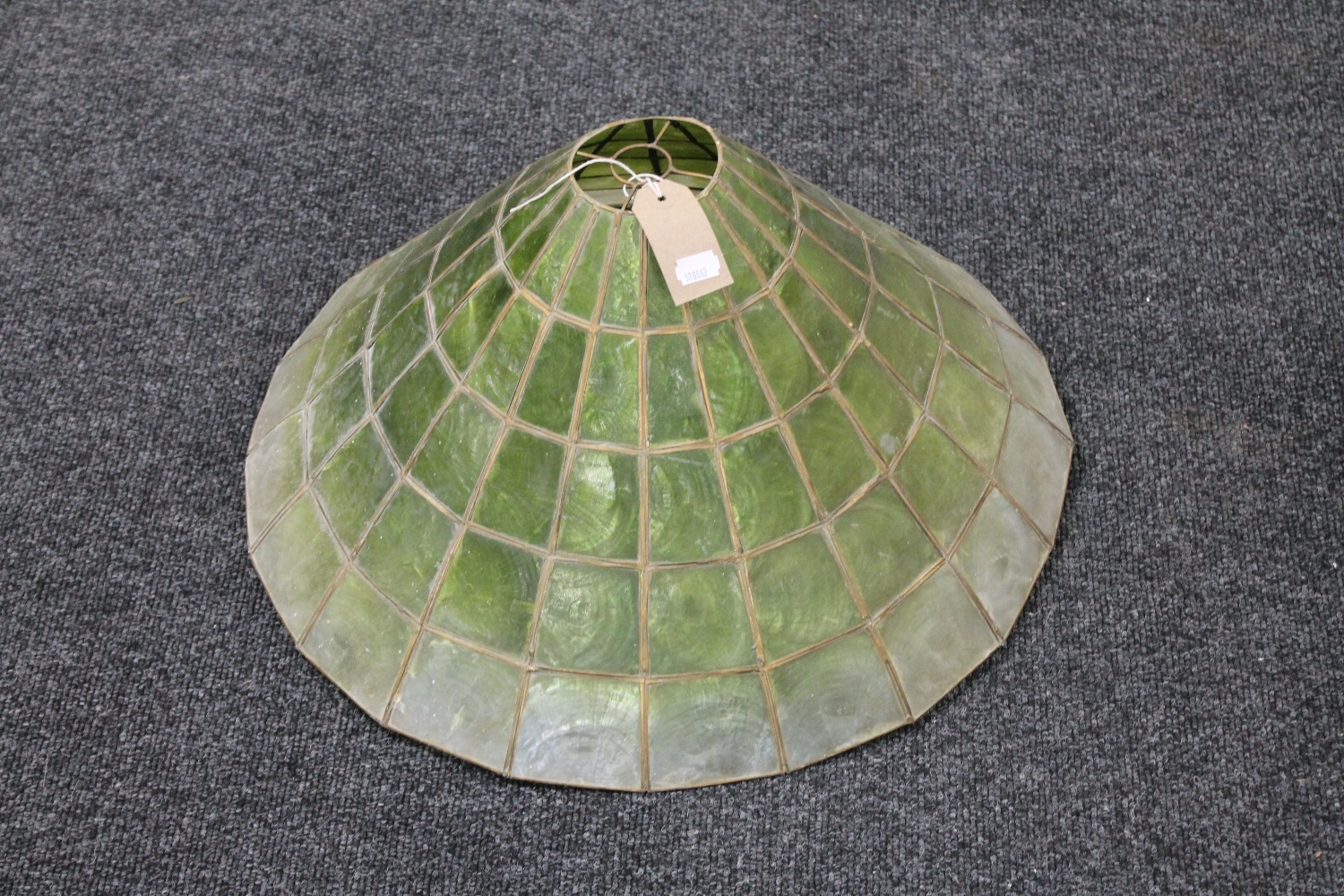 A Tiffany style green glass light shade