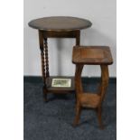 An oak barley twist leg table and a carved pine two tier plant stand