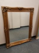 A gilt framed mirror,