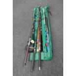 A fishing rod bag of boat and beach casting rods : Shakespeare etc,
