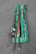 A fishing rod bag of boat and beach casting rods : Shakespeare etc,