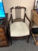 An Edwardian mahogany armchair,