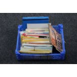 A box of assorted folded road maps, Bero cook books,