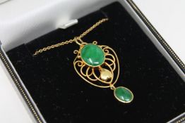 A 15ct gold jade set pendant on chain