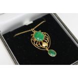 A 15ct gold jade set pendant on chain