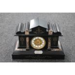 A Victorian black slate and marble presentation mantel clock with brass and enamelled dial