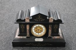 A Victorian black slate and marble presentation mantel clock with brass and enamelled dial