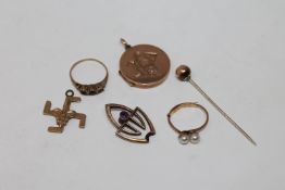 A 9ct gold locket, stick pin, two rings,
