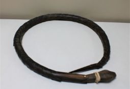 An early twentieth century wooden articulated toy snake
