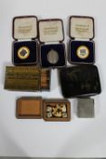 An antique Bryant & May's matchbox holder, an oriental cigarette case,