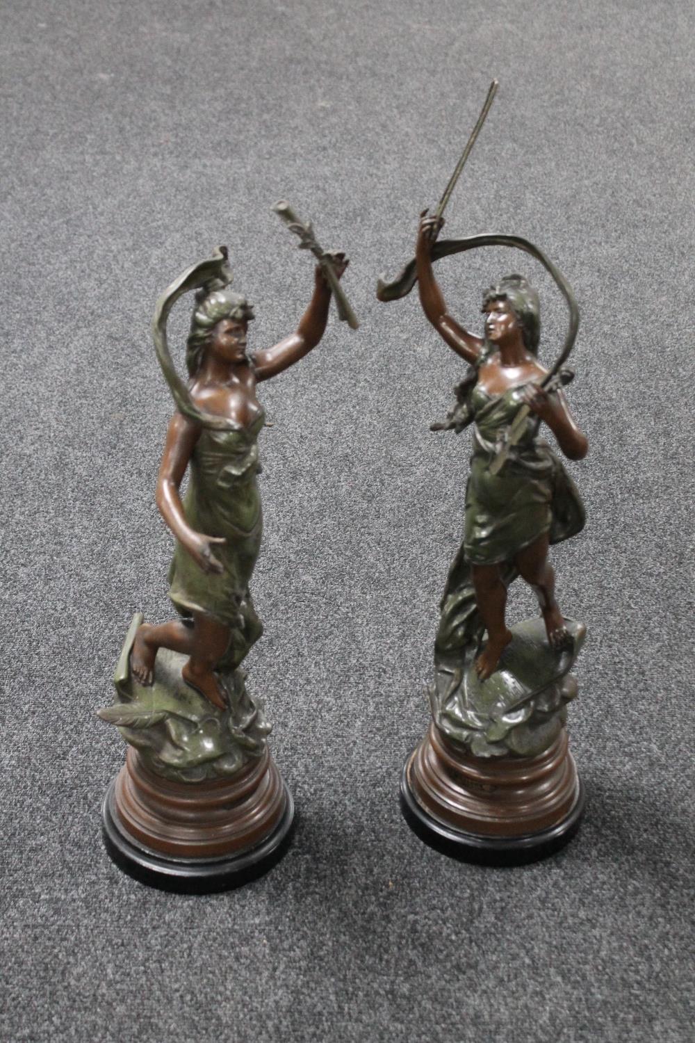 A pair of early 20th century painted spelter figures; Musique and Chanson,
