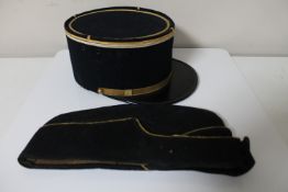 A vintage French police hat together with an early 20th century military hat