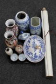 A tray of oriental wares including a scroll, blue and white lidded urn, hand fan, tureen,