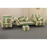 An antique style chaise longue with footstool and scatter cushions plus a pair of matching