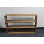 A set of antique pine open bookshelves