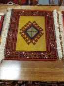 A fringed Caucasian mat,