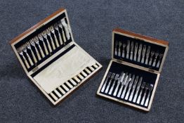 A mahogany canteen of mother of pearl handled fish cutlery and one other similar