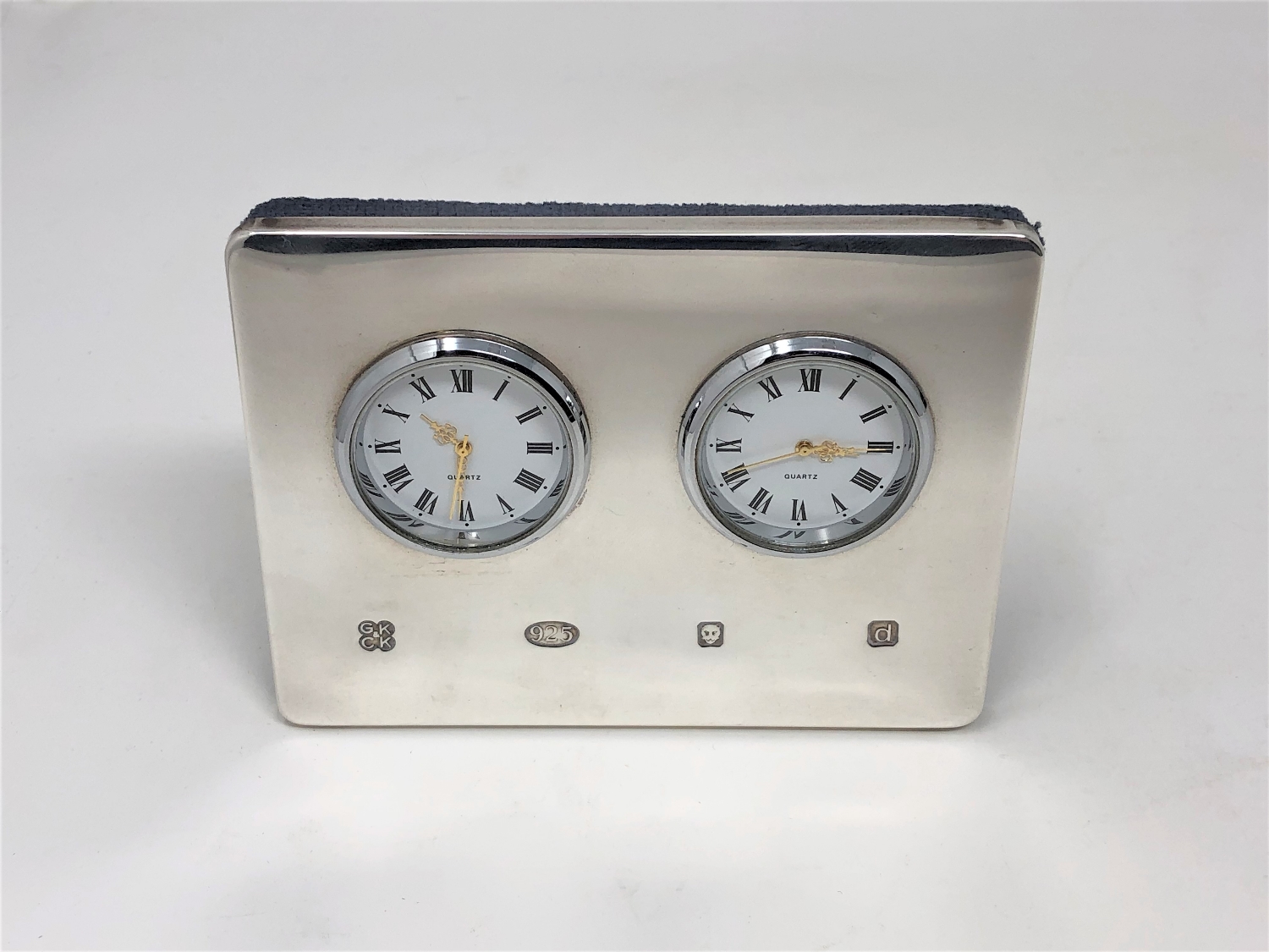 A silver quartz desk timepiece, Kitney & Co, London 2003,