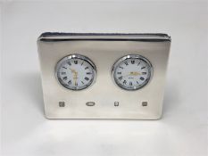 A silver quartz desk timepiece, Kitney & Co, London 2003,