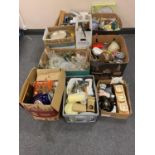 A pallet of nine boxes of bric a brac, glass ware, serving trays,