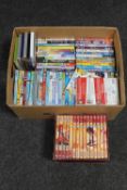 A box of assorted children's DVDs,