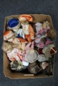 A box of porcelain headed dolls