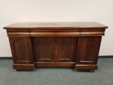A Victorian mahogany inverted breakfronted sideboard, width 181 cm.