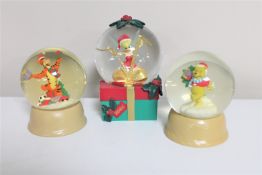 Three Christmas Disney snow globes : Winnie the Pooh,