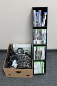 A box of Xbox 360 leads and accessories, computer keyboard, two bicycle helmets,