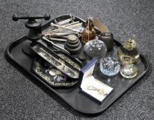 A tray containing vintage weights, glass paperweights, nutcrackers, oriental lacquered pen tray,