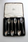 A set of six cased silver teaspoons,