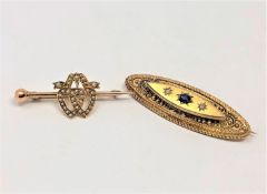 A 15ct gold sapphire and diamond brooch,