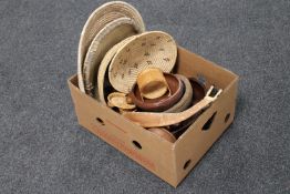 A box of wicker bowls, treen bowls,