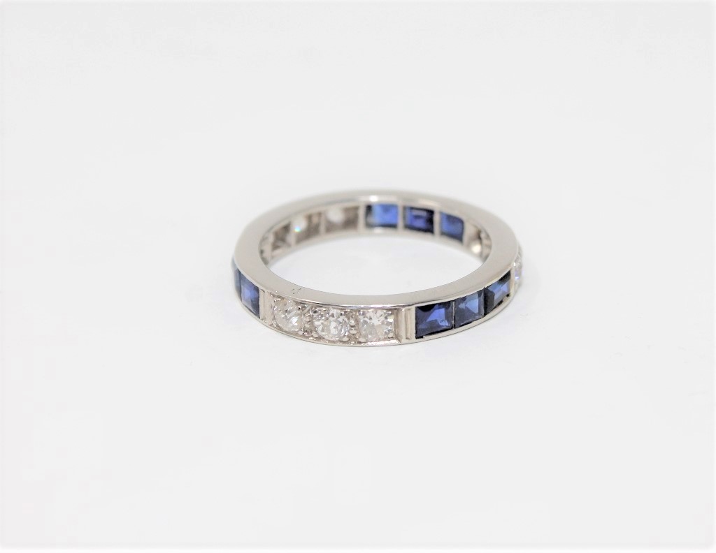 A fine antique platinum sapphire and diamond set full eternity ring,