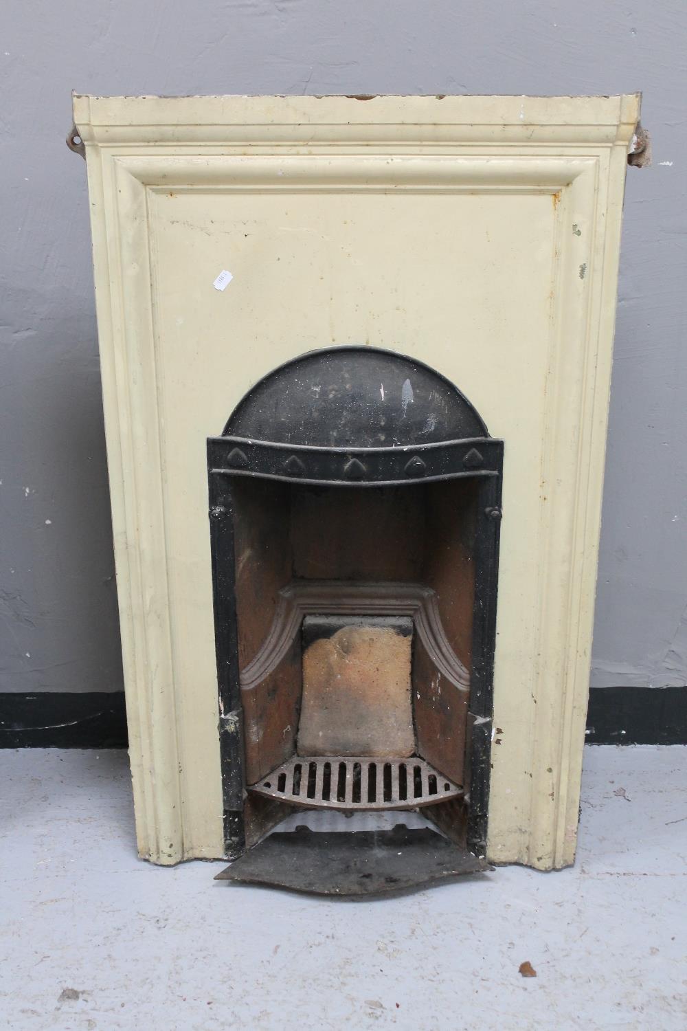A Victorian cast iron fire place