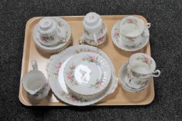 A tray of twenty piece Royal Albert Moss Rose china tea service