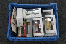 A crate of twelve assorted die cast vehicles